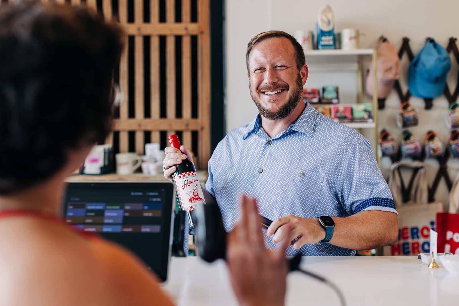 Customer at a retail counter.